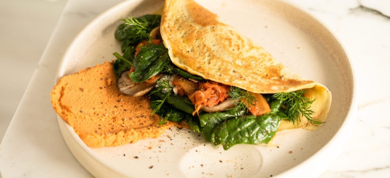 Delicious omelette with vegetables and meats